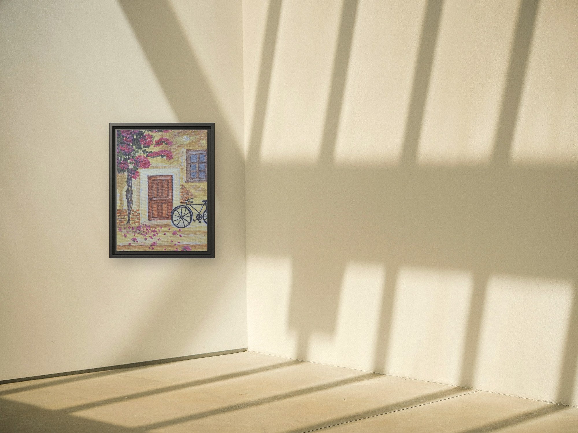 An 18 by 24 inch framed canvas print shown at scale on a corner wall in afternoon light